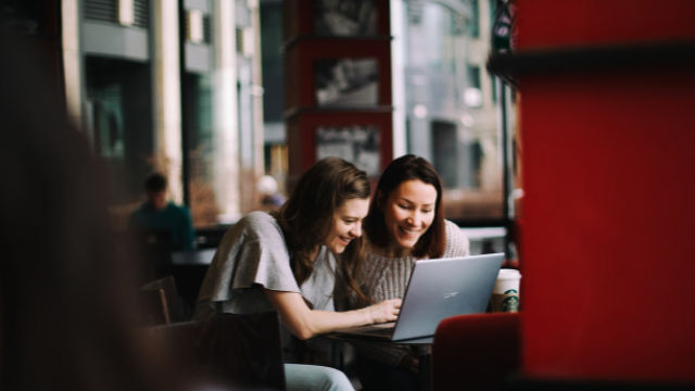 two women at laptop